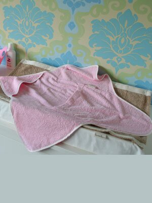 Badcape med istoppsficka