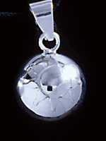 Bola m�nstrad med sol och m�ne